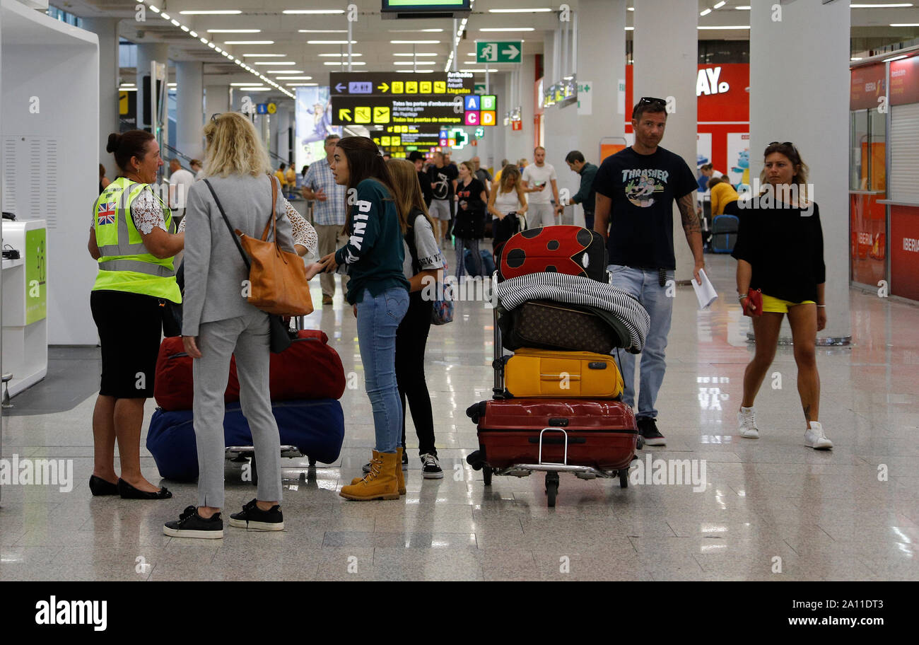 Palma, Spain. 23rd Sep, 2019. Passengers at Palma de Mallorca Airport on the day of the failure of Thomas Cook. The efforts to rescue the battered British tourism group Thomas Cook have failed. The second largest travel company in Europe announced that a corresponding insolvency petition had already been filed in court. Credit: Clara Margais/dpa/Alamy Live News Stock Photo