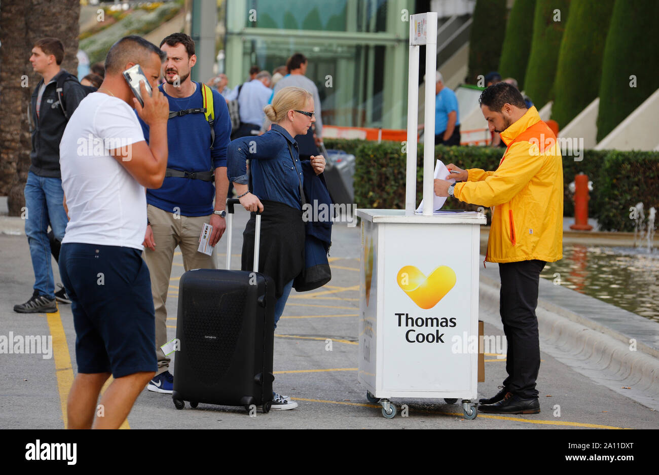 Palma, Spain. 23rd Sep, 2019. Passengers are standing at an information desk at Palma de Mallorca Airport on the day of Thomas Cook's failure. The efforts to rescue the battered British tourism group Thomas Cook have failed. The second largest travel company in Europe announced that a corresponding insolvency petition had already been filed in court. Credit: Clara Margais/dpa/Alamy Live News Stock Photo
