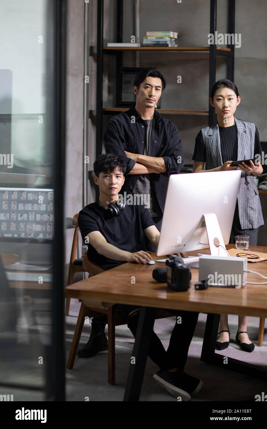 Photographers in studio Stock Photo