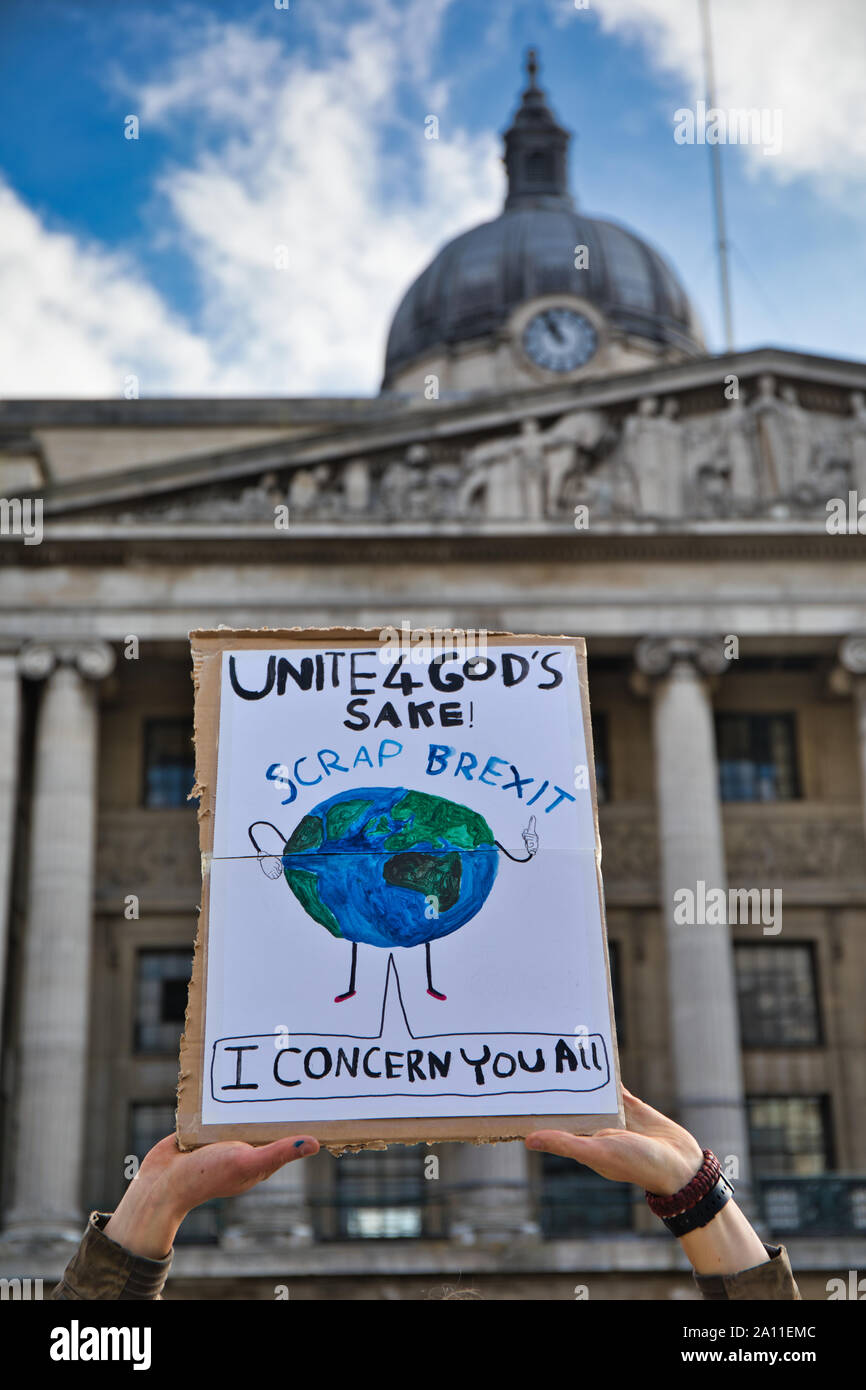 Student protester holding up a scrap brexit placard at the 20th September 2019 Global climate strike, Old Market Square, Nottingham, England Stock Photo