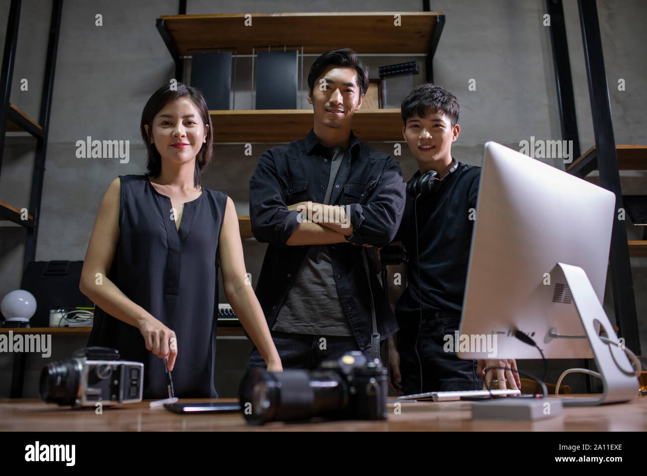 Photographers in studio Stock Photo