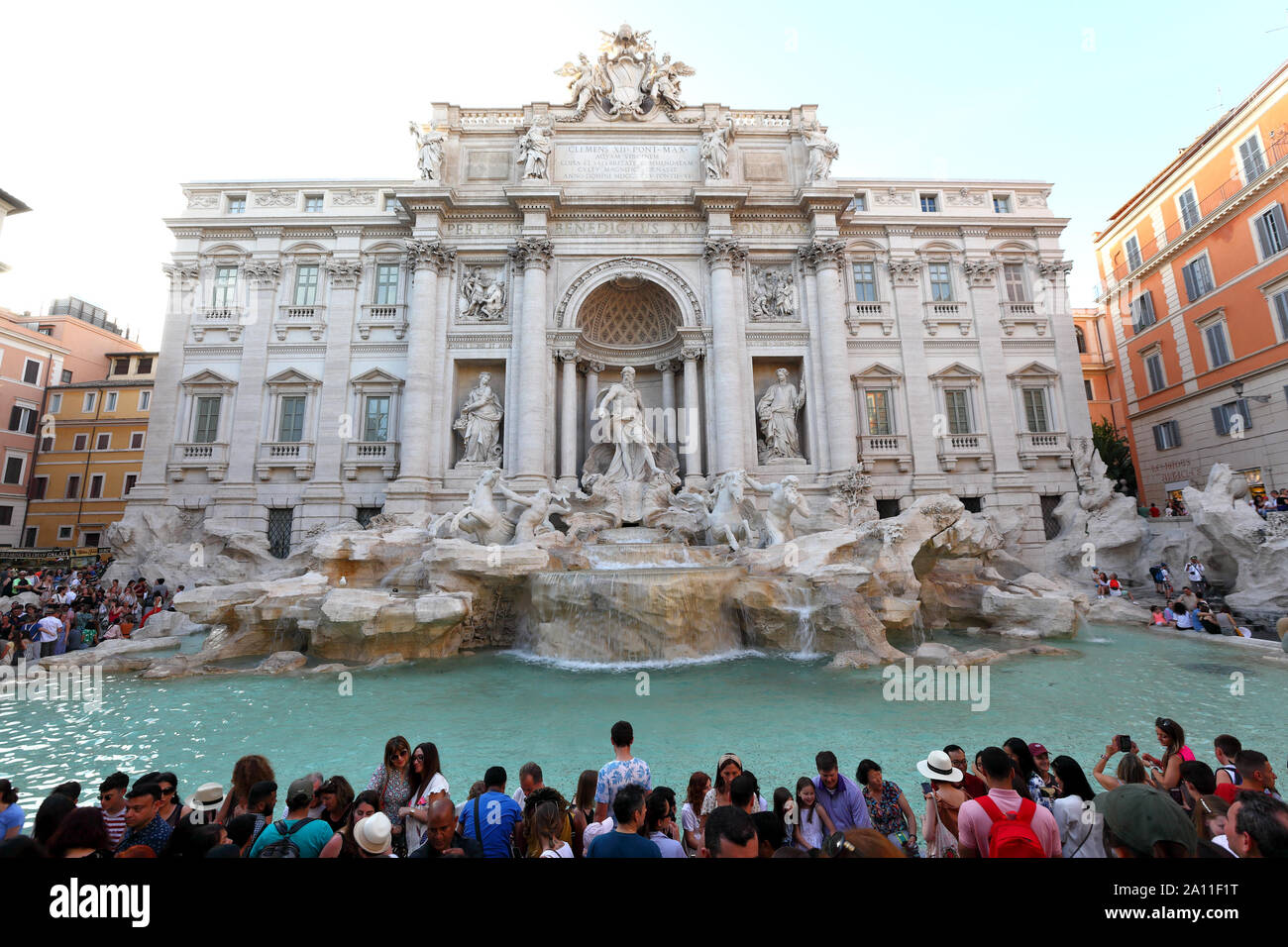Editorial Rome, Italy - June 15th 2019: Tourists flock to the Trevi Fountain, a major architectural and artistic landmark. Stock Photo