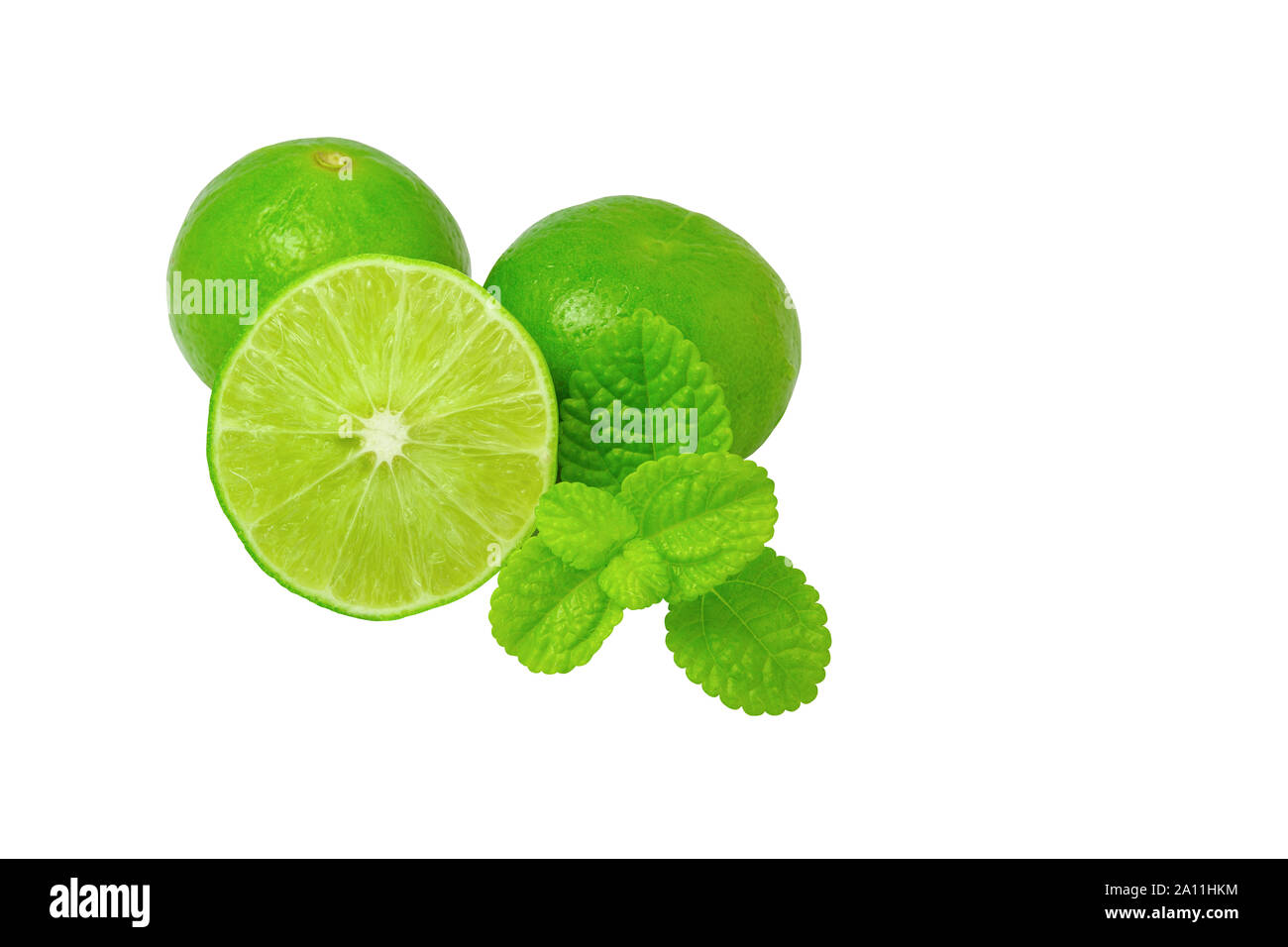 Fresh Limes with Cut in half on a white background and copy space Stock