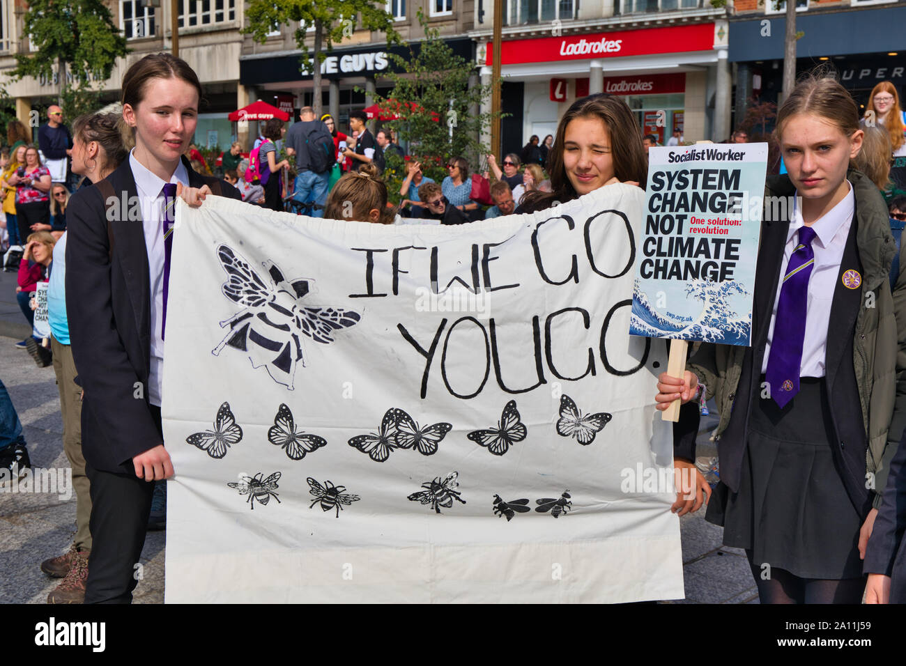 Student climate change activists with banner and placard at the 20th September 2019 Global climate strike, Old Market Square, Nottingham, England Stock Photo