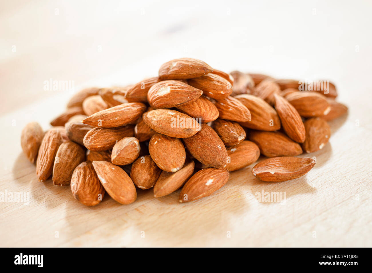 Pile of almonds nuts Stock Photo