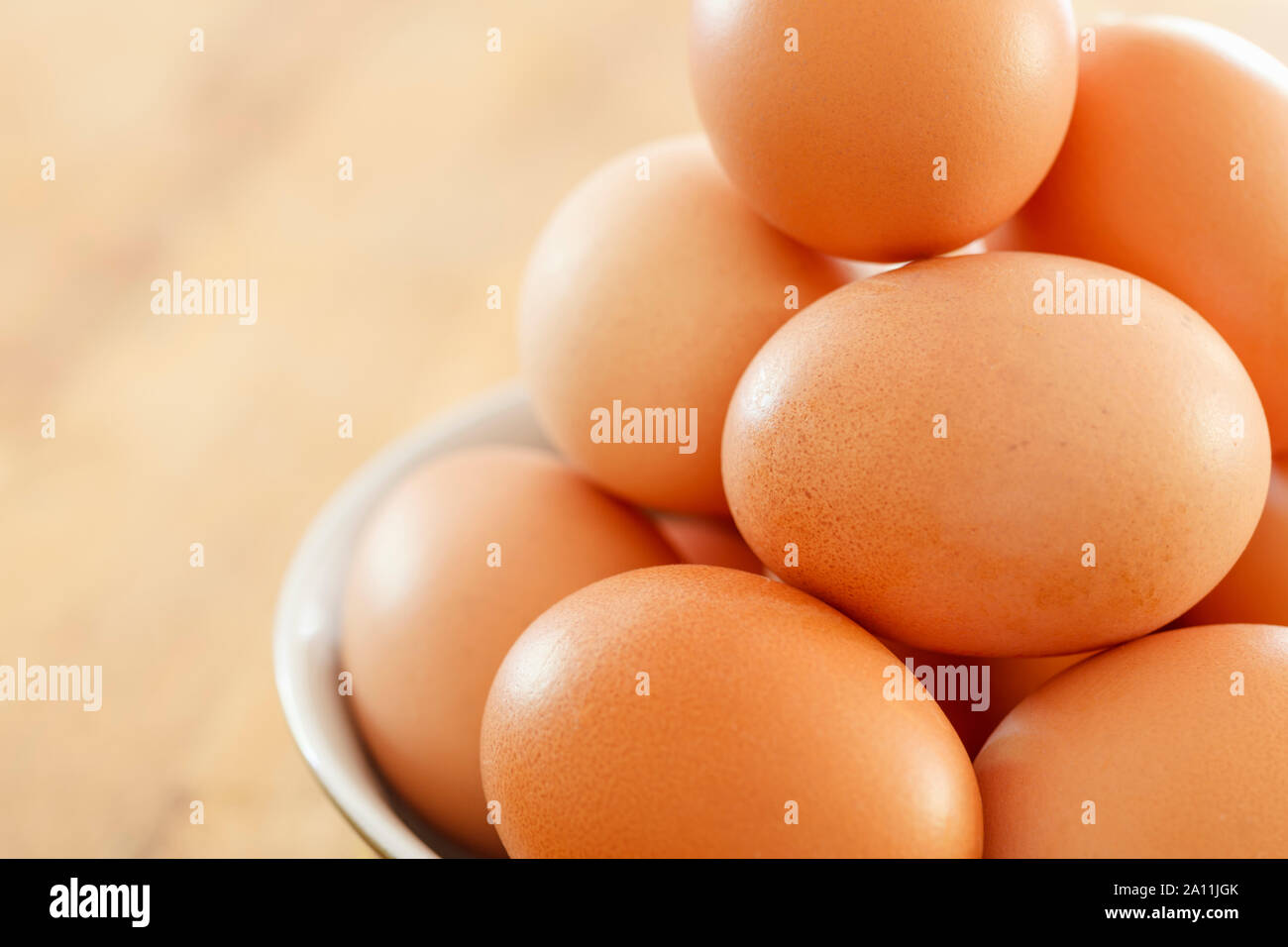Bowl of hens eggs, close up Stock Photo