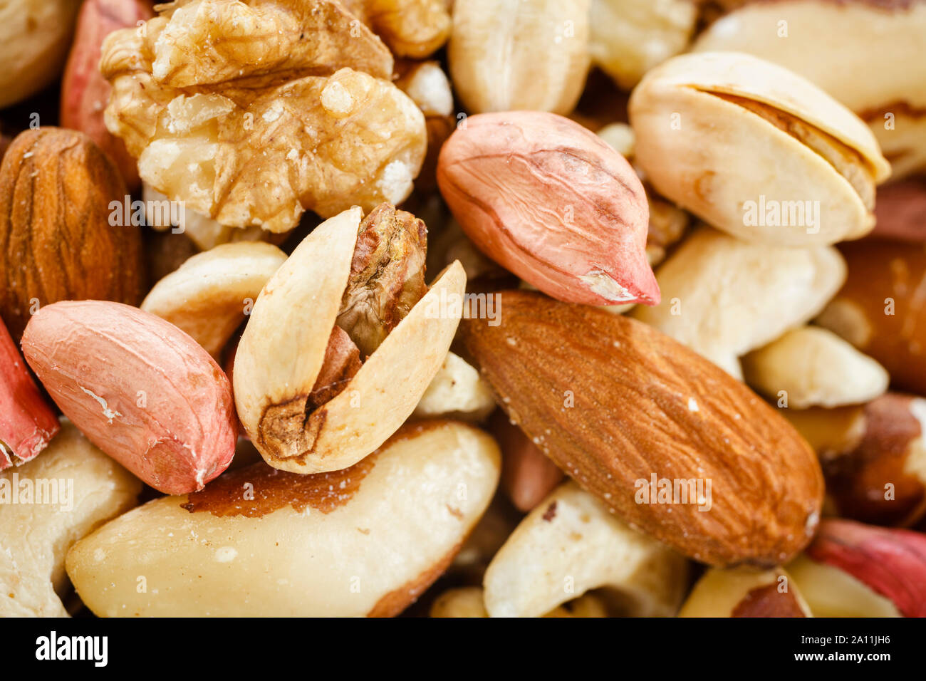 Mixed pile of nuts close up Stock Photo