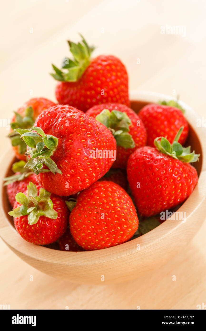 Strawberries in a bowl, pile Stock Photo