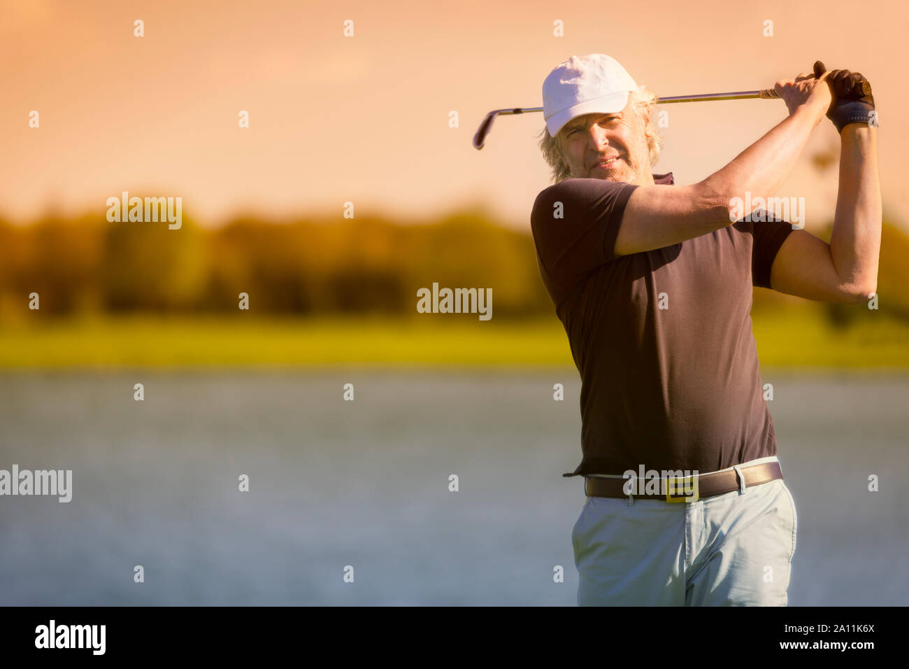 Male senior golfer front view. Stock Photo