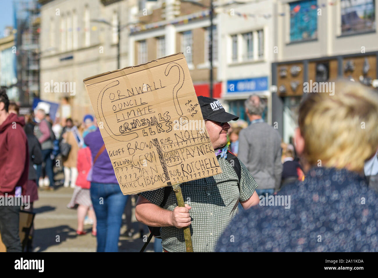 A crude hand written placard carried by a protester participating in the Extinction Rebellion climate strike in Truro City City in Cornwall. Stock Photo