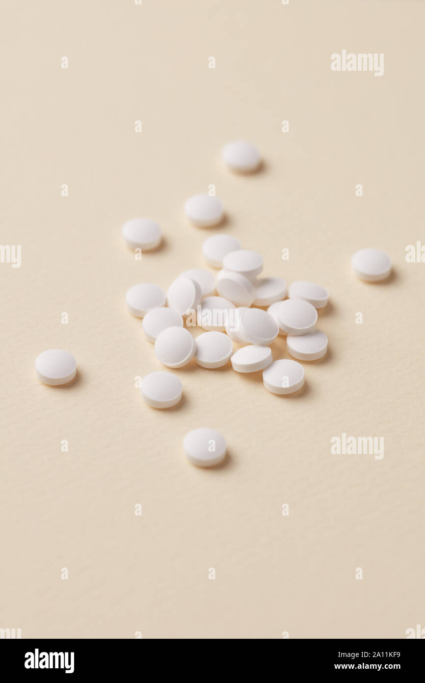 Biotin Tablets. Bright paper background. Close up. Copy space Stock ...