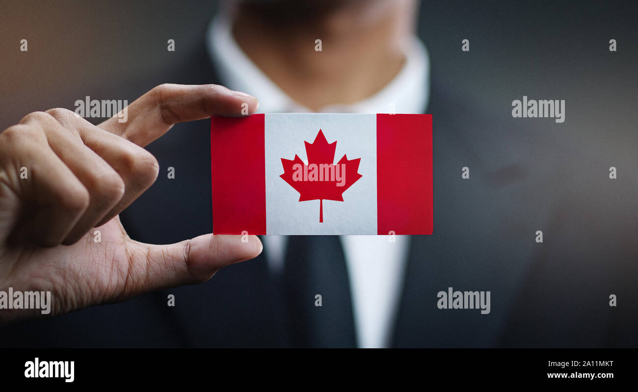 Canadian man holding canadian flag hi-res stock photography and images ...