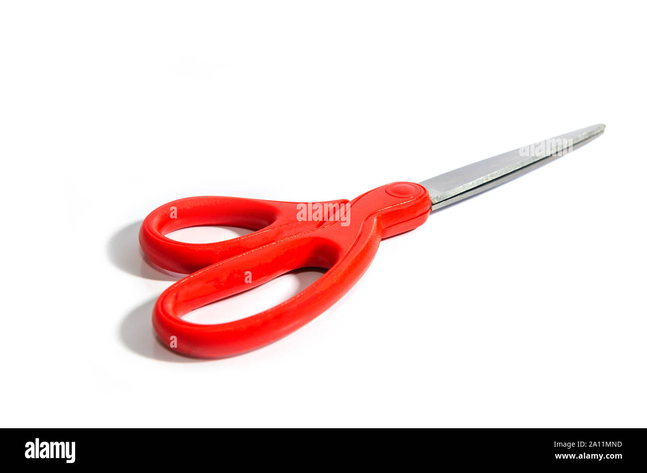 Red scissors isolated from white background Stock Photo