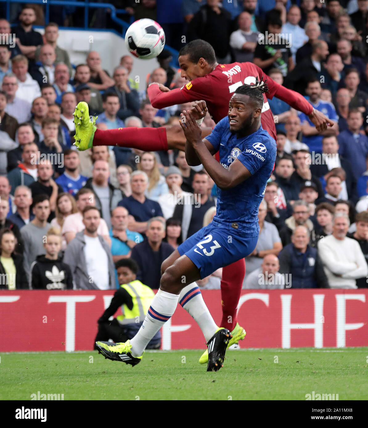 LONDON, ENGLAND - SEPTEMBER 22: Liverpool’s Joel Matip (L) and Chelsea’s Michy Batshuayi fight for the ball during the Premier League match between Chelsea FC and Liverpool FC at Stamford Bridge on September 22, 2019 in London, United Kingdom. (Hugo Philpott/MB Media) Stock Photo