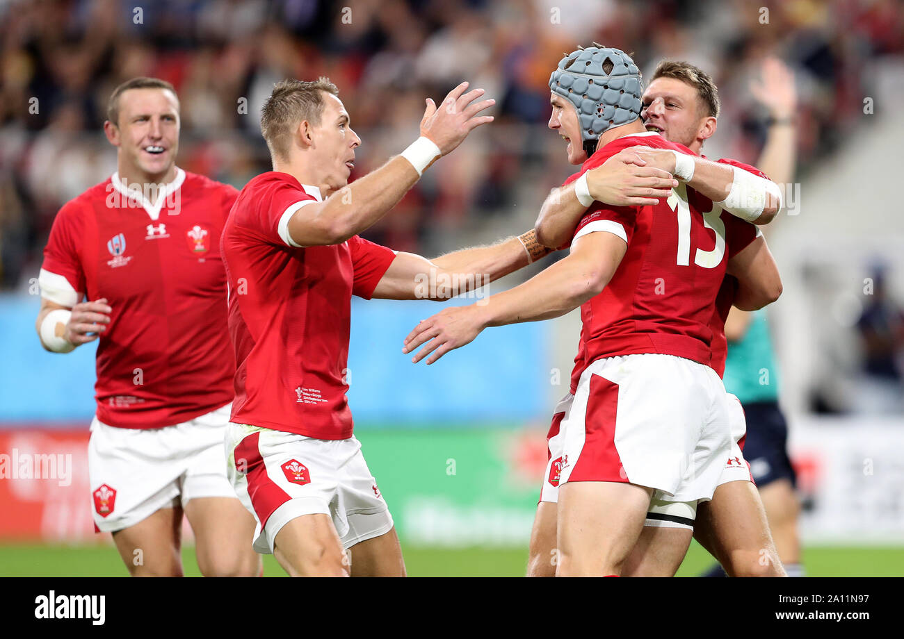 Wales Jonathan Davies 13 Celebrates With Team Mates Liam Williams Left And Dan Biggar After Scoring His Side S First Try During The 19 Rugby World Cup Pool D Match At City Of Toyota