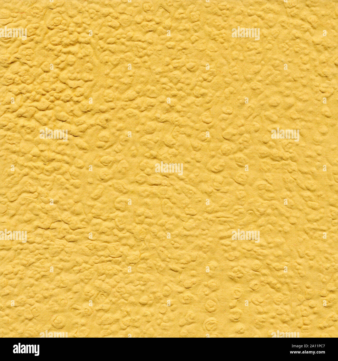 Yellow paper background with pattern. Handmade paper Stock Photo