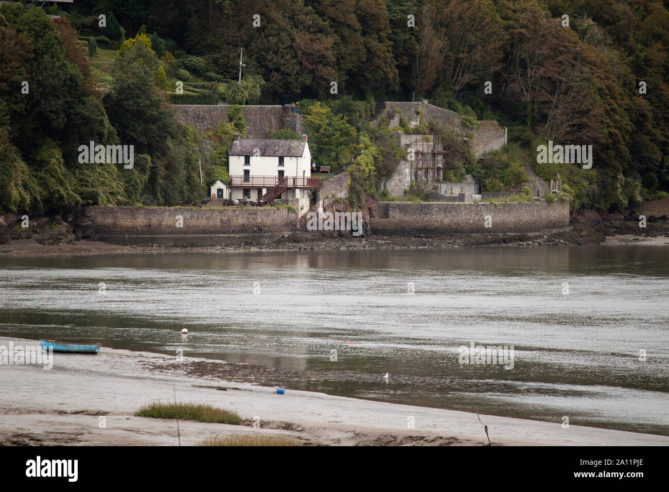 The home (white house) in Laugharne where Dylan Thomas wrote poetry in particular 'Poem in October' which he wrote on his 30th birthday. Stock Photo