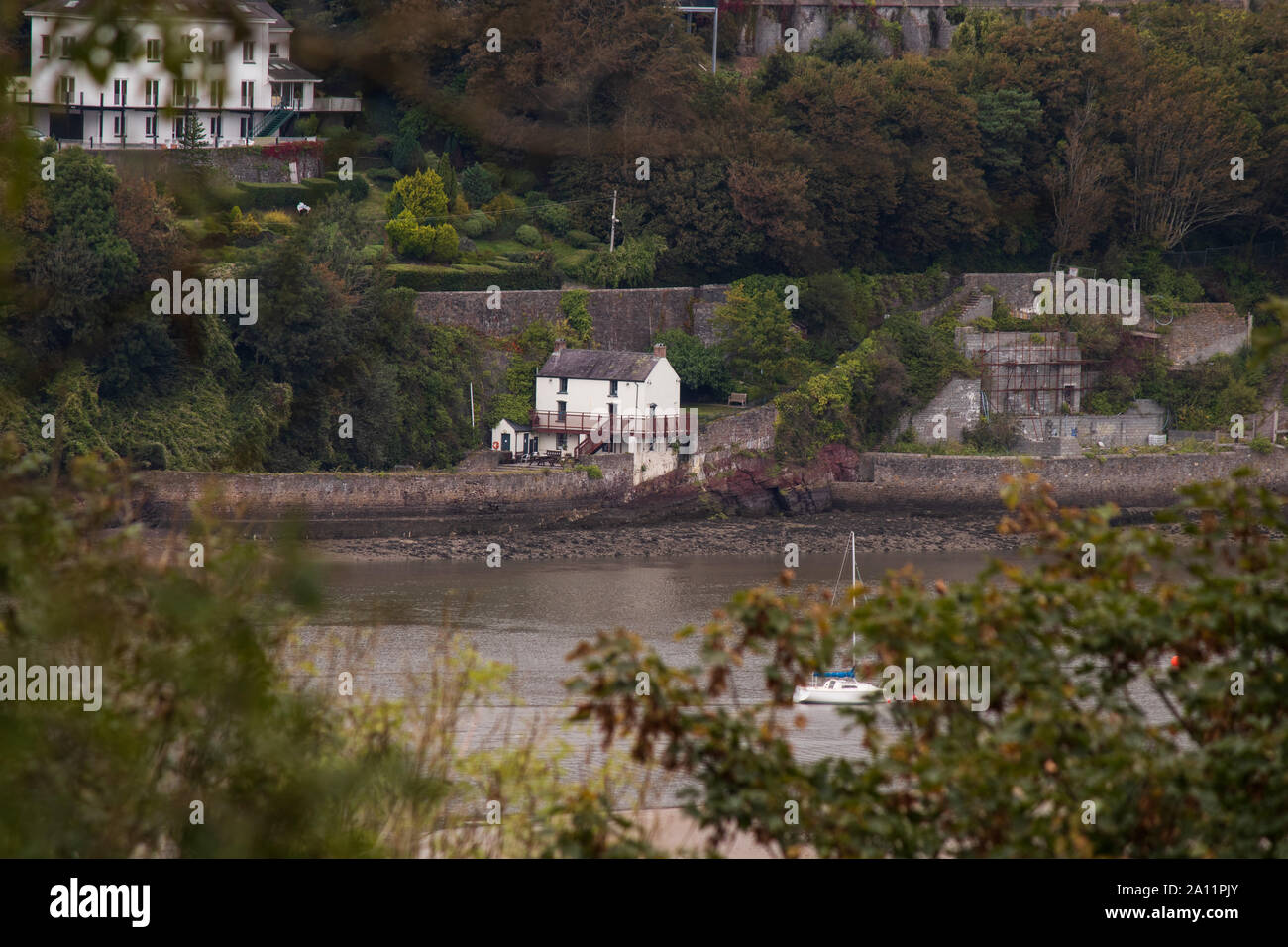 The home (white house) in Laugharne where Dylan Thomas wrote poetry in particular 'Poem in October' which he wrote on his 30th birthday. Stock Photo