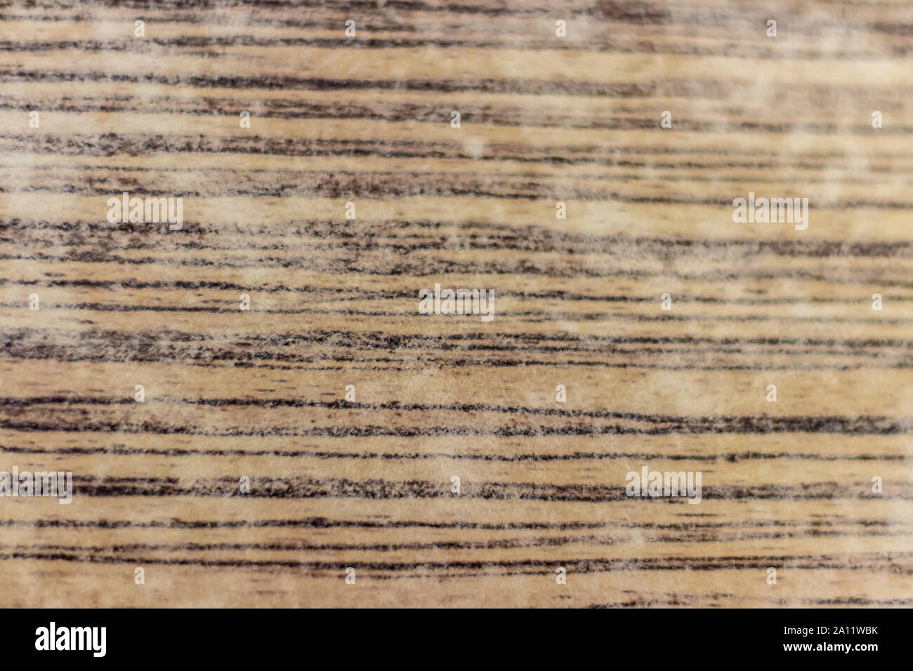a smooth wood texture with brown lines on it. a closeup macro texture shoot Stock Photo