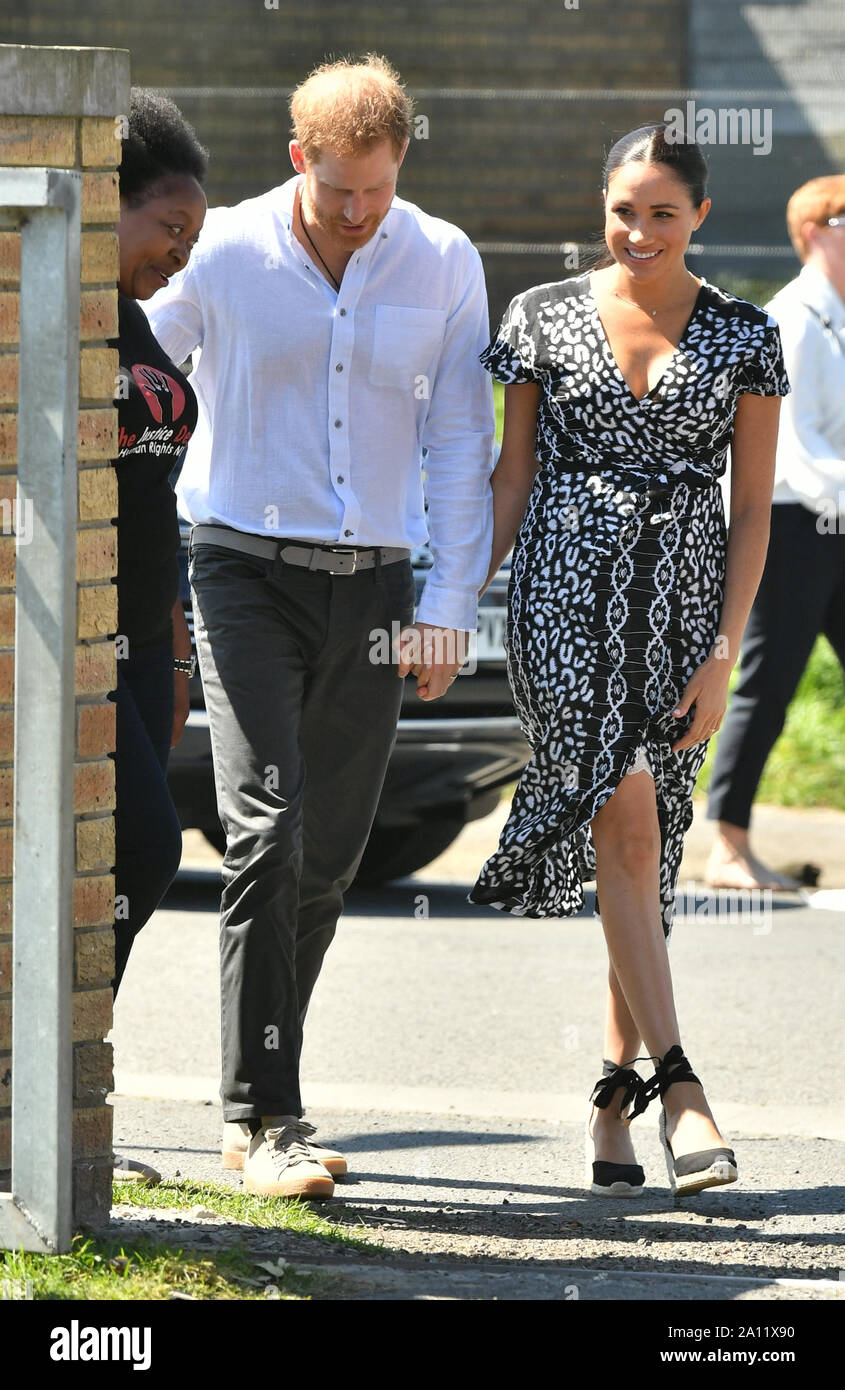 The Duke and Duchess of Sussex arrive at the Nyanga Township in Cape Town, South Africa, for a visit to a workshop that teaches children about their rights, self-awareness and safety, on the first day of their tour of Africa. Stock Photo