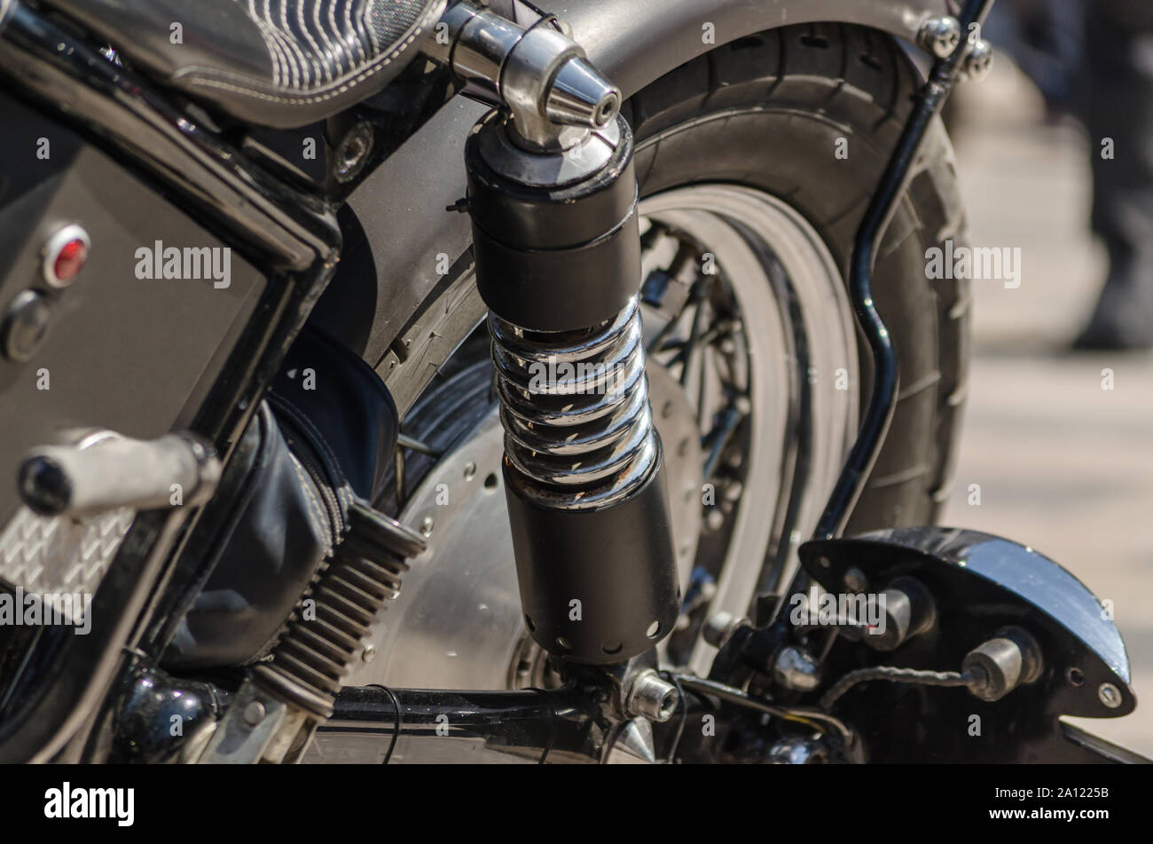 Close up of motorcycle shock absorber on back wheel Stock Photo - Alamy