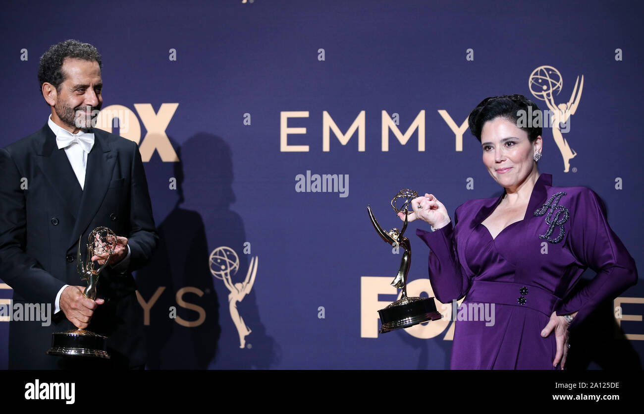 Los Angeles, USA. 22nd Sep, 2019. Tony Shalhoub (L) and Alex Borstein pose with the awards for outstanding supporting actor and actress in a comedy series for 'The Marvelous Mrs. Maisel' during the 71st Primetime Emmy Awards in Los Angeles, the United States, Sept. 22, 2019. Credit: Li Ying/Xinhua/Alamy Live News Stock Photo
