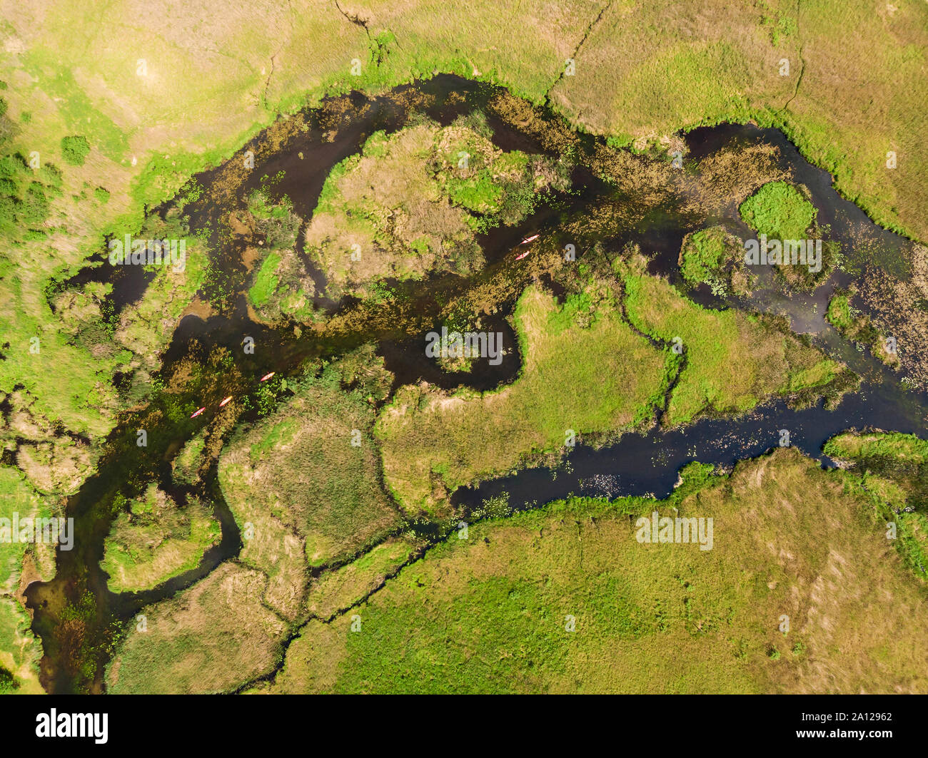 Aerial view of kayaks on Krutynia river on a sunny day, Poland Stock Photo