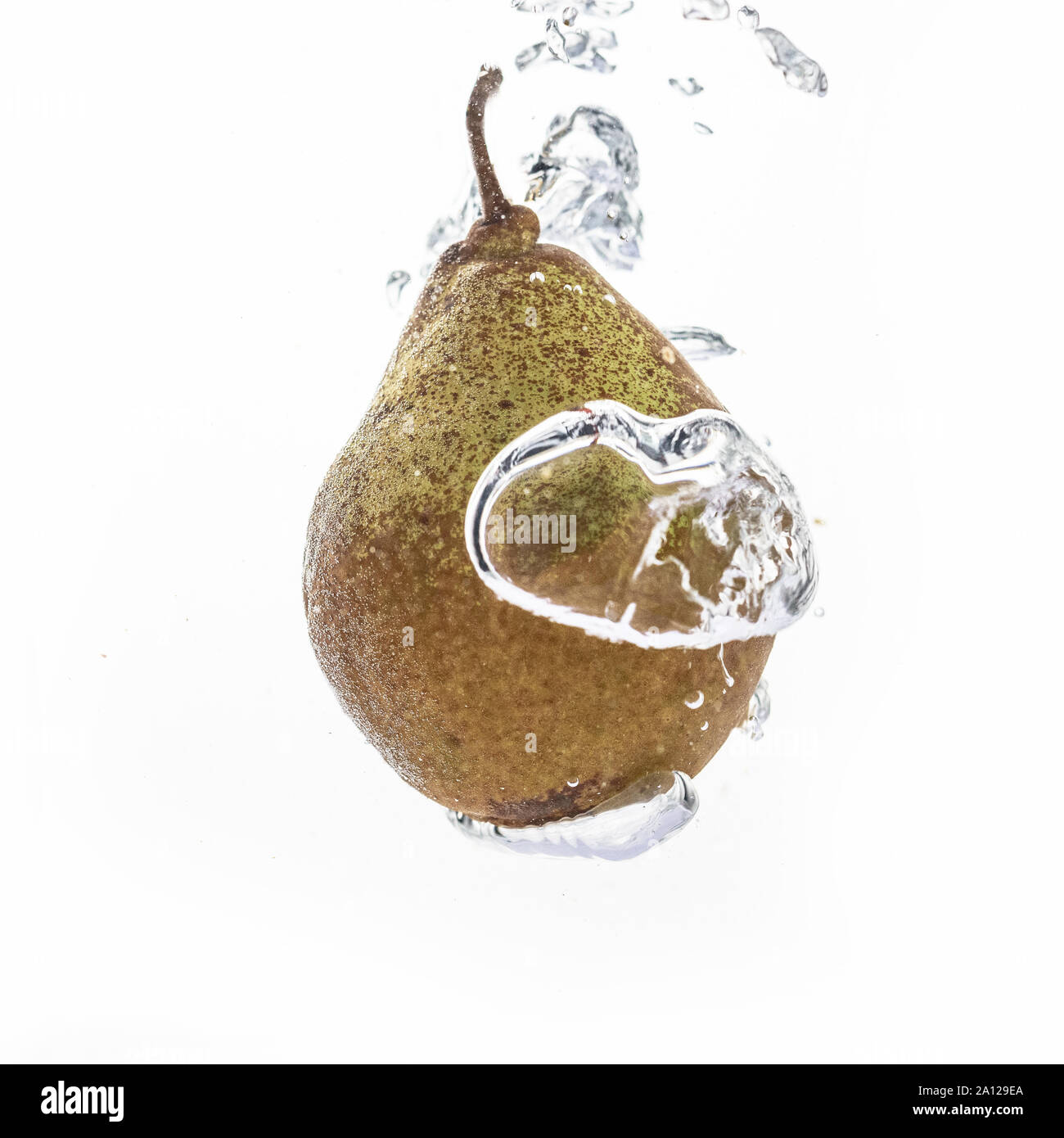 Beautiful fresh pear in water bubble white background Stock Photo Alamy