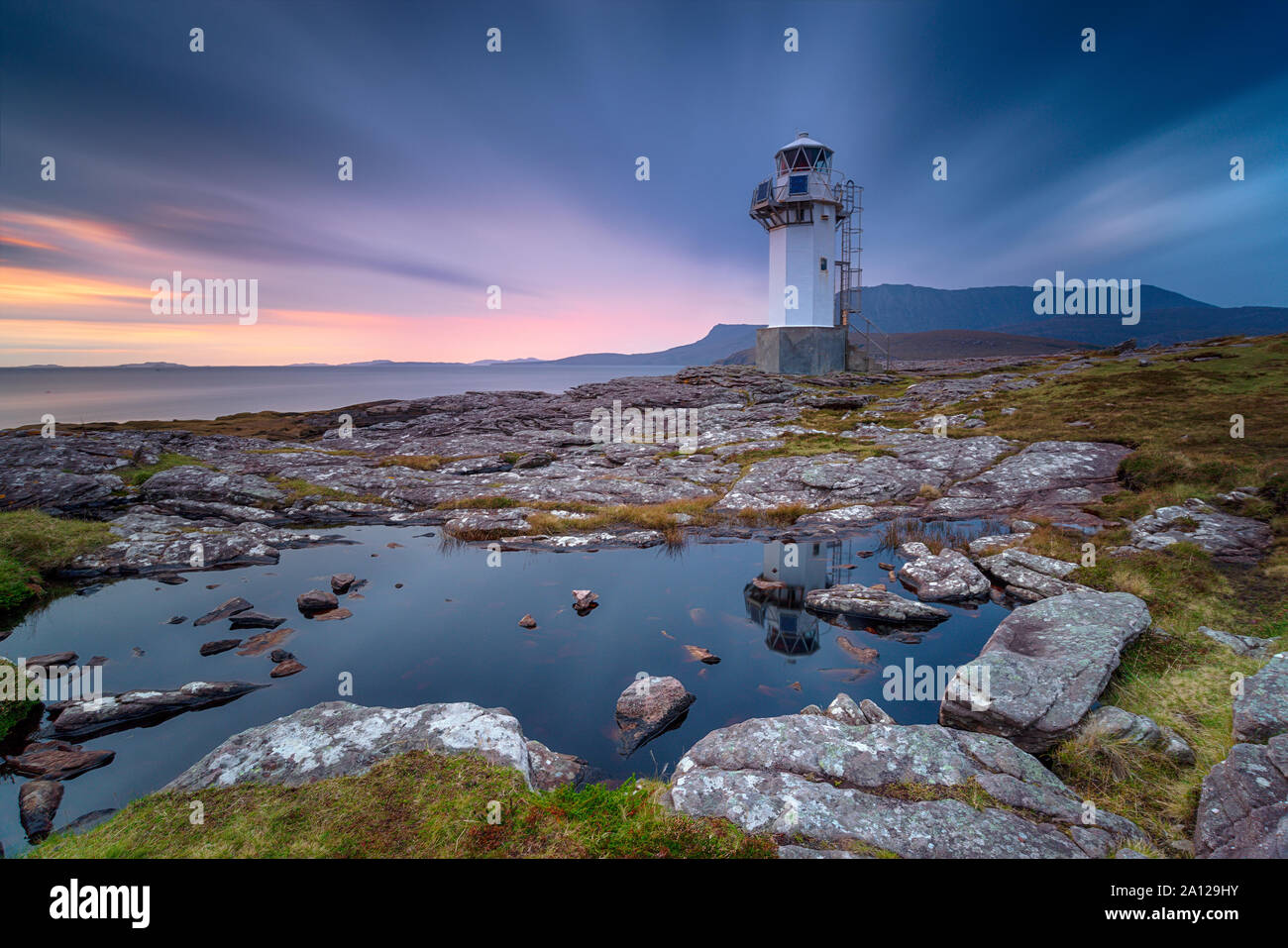 A long exposure of the lighthouse at Rhue Stock Photo