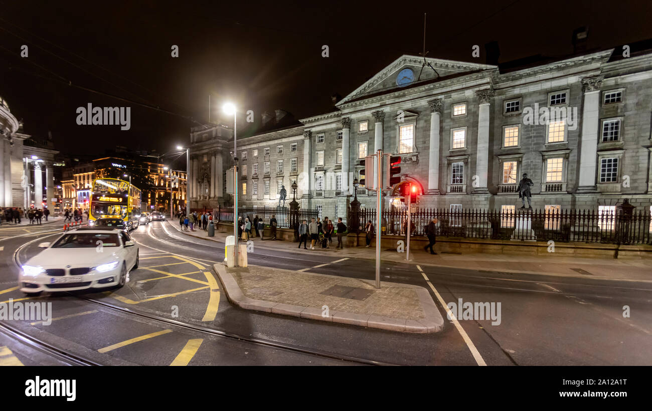 A view from College Green of cars and public transportation by the Bank of England and Trinity College. Stock Photo