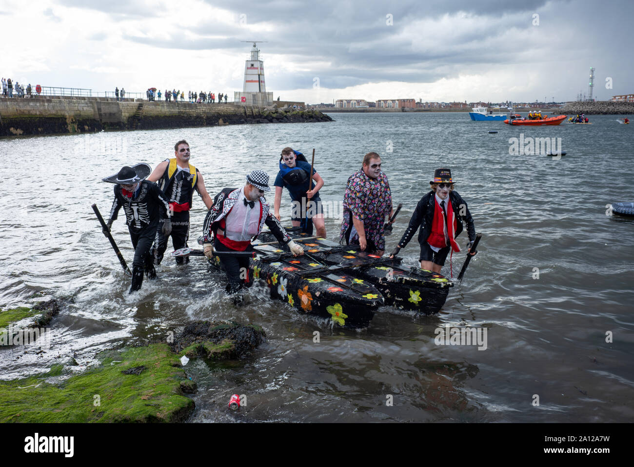 Competitors in a Raft Race, Hartlepool , England. Stock Photo