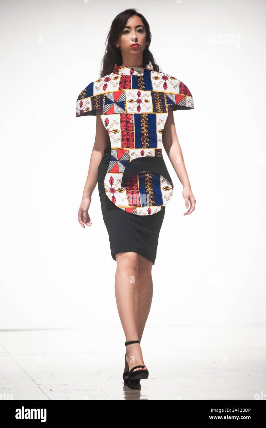 A model showcases a fashion design for Djuidje Couture during the event.The fourth edition of the Afro Fashion Week organised by Michelle Francine Ngonmo (president, originally from Cameroon), and Ruth Akutu Maccarthy (vice-president, originally from Ghana). The event promotes and spreads works from African designers and those inspired by Africa. Stock Photo