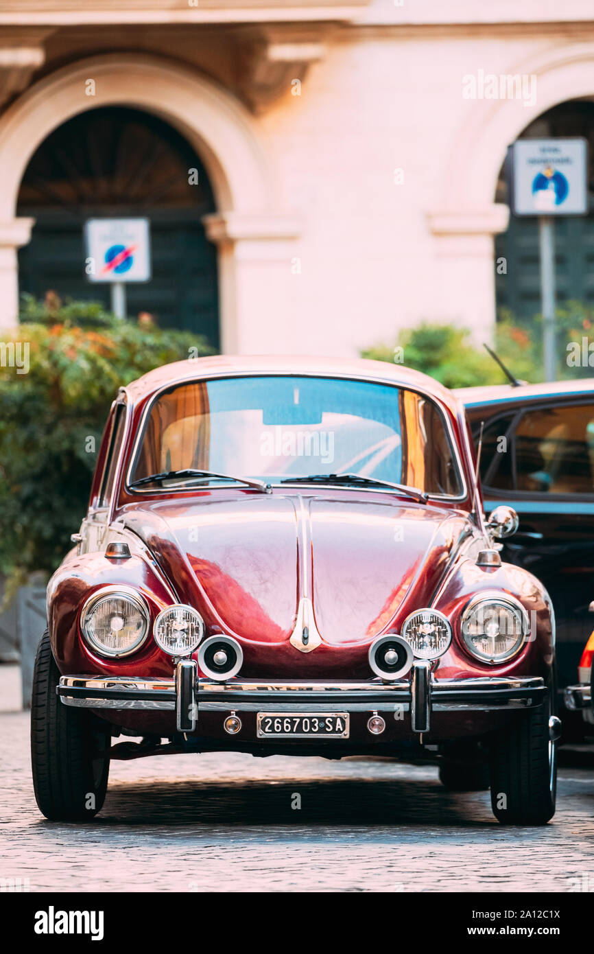 Rome, Italy - October 20, 2018: Old Retro Vintage Red Color Volkswagen Beetle Car Parked At Street. Stock Photo