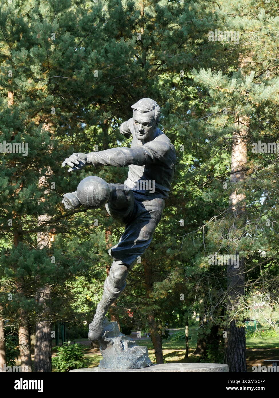 St. Petersburg, Russia, August 27, 2019 Monument to the football player Vsevolod Bobrov, soccer player kick  ball in motion Stock Photo