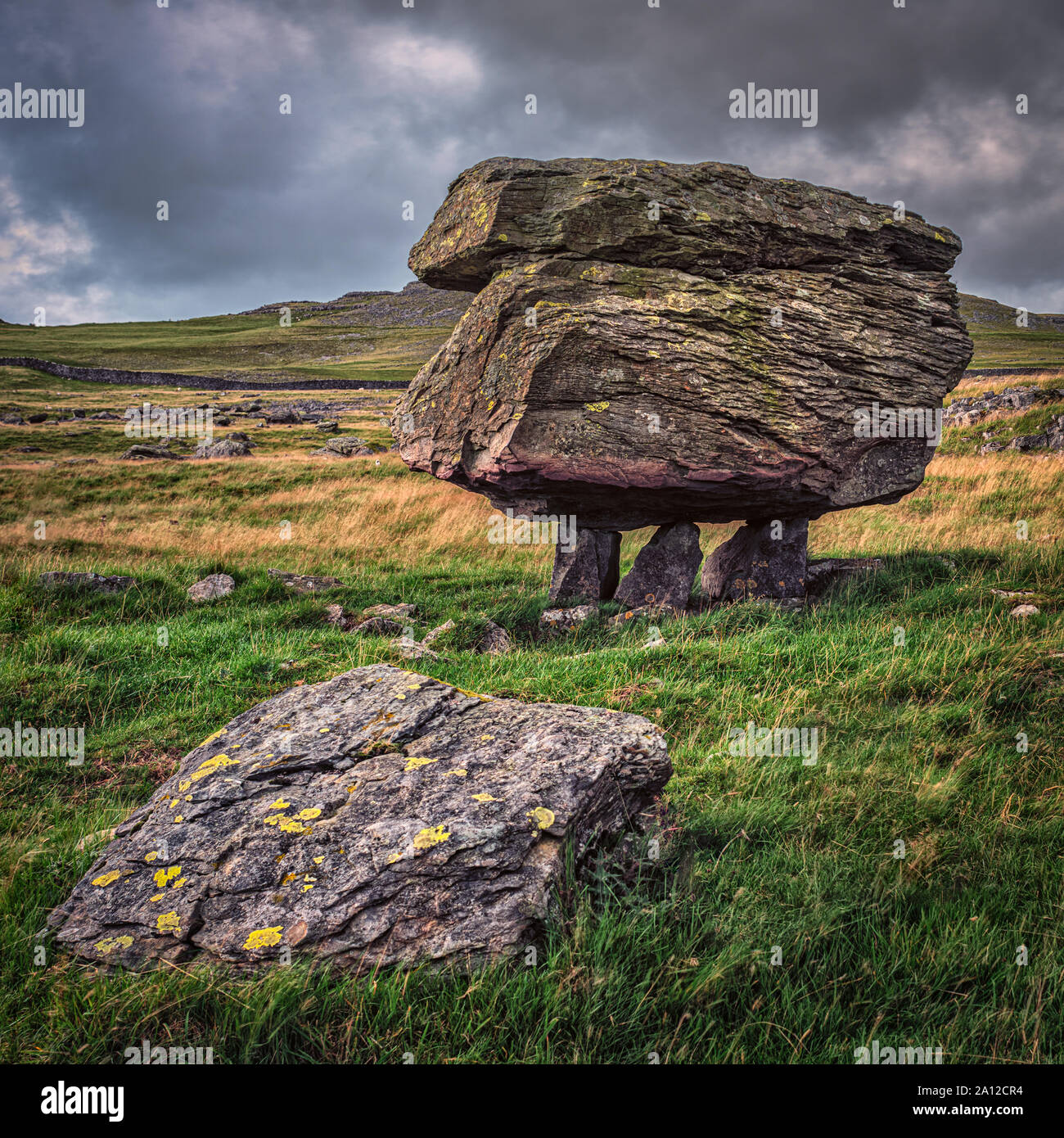 The Norber erratics are a geologically significant set of glacial erratic boulders in the Yorkshire Dales. Stock Photo