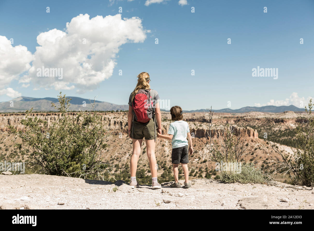Two teen boys holding hands hi-res stock photography and images - Alamy