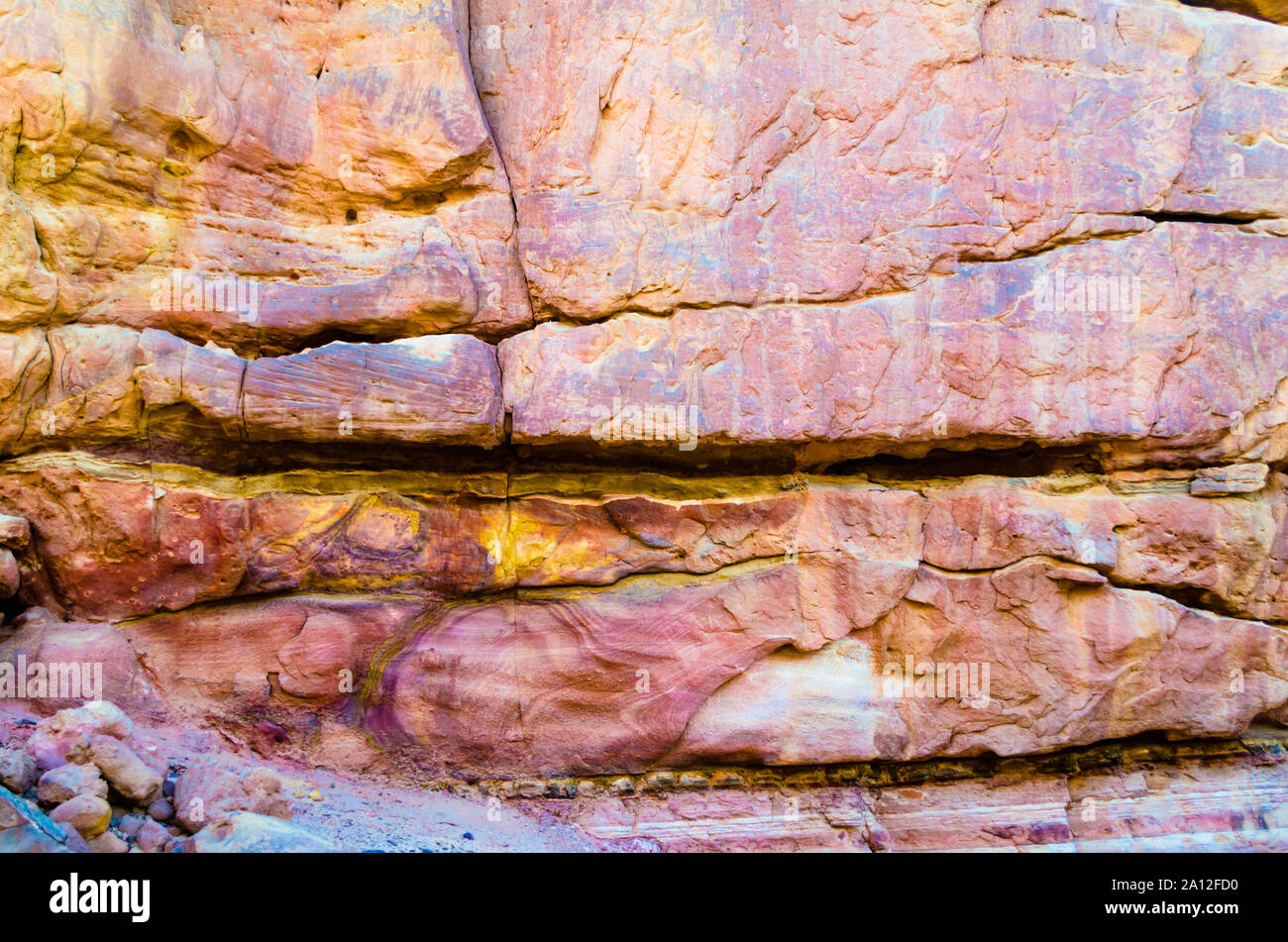 texture of orange stone rock in a colored canyon closeup Stock Photo ...