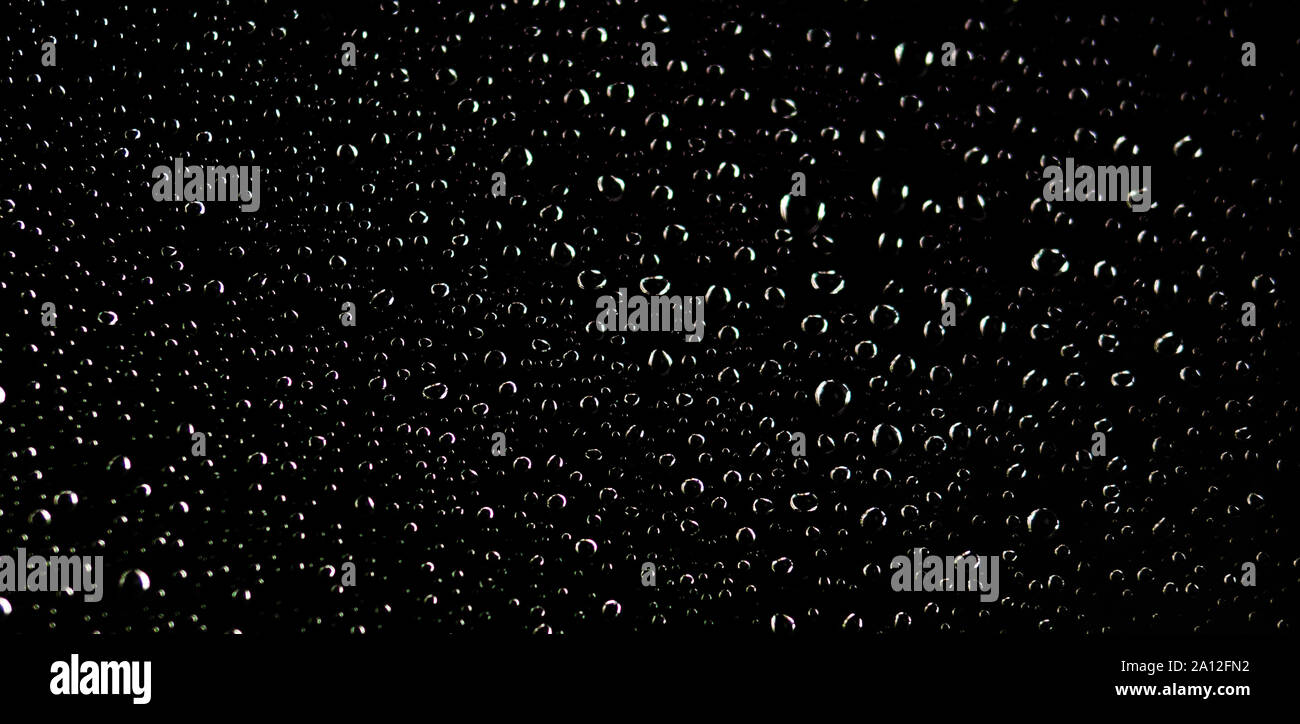 water drop on black background Stock Photo - Alamy