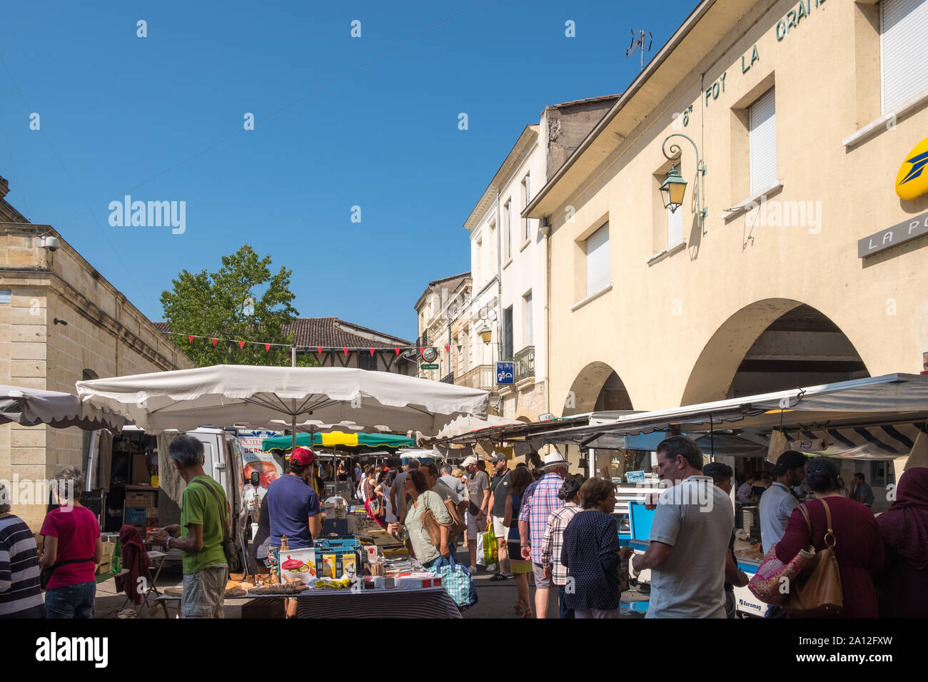 The popular saturday street market in Sainte-Foy-La-Grande in the Gironde Department of South Western France Stock Photo