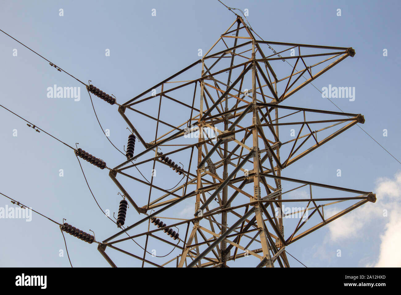 High voltage electricity poles used for power transmission Stock Photo