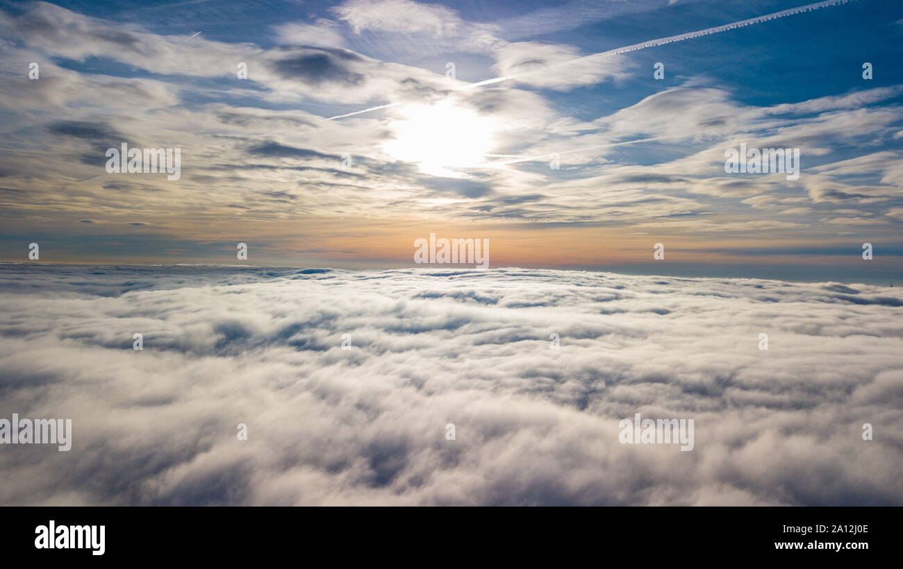 Drone view over the fog in Italy Stock Photo