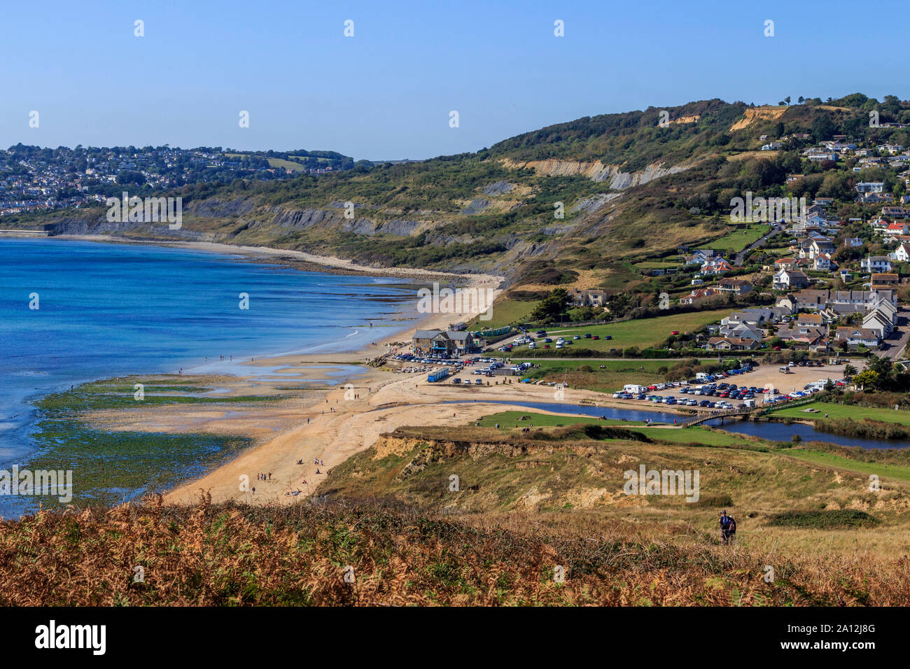 charmouth seaside resort, crumbling cliff strata, fossil hunting, south coast, long distance footpath,dorset, england, uk, gb Stock Photo