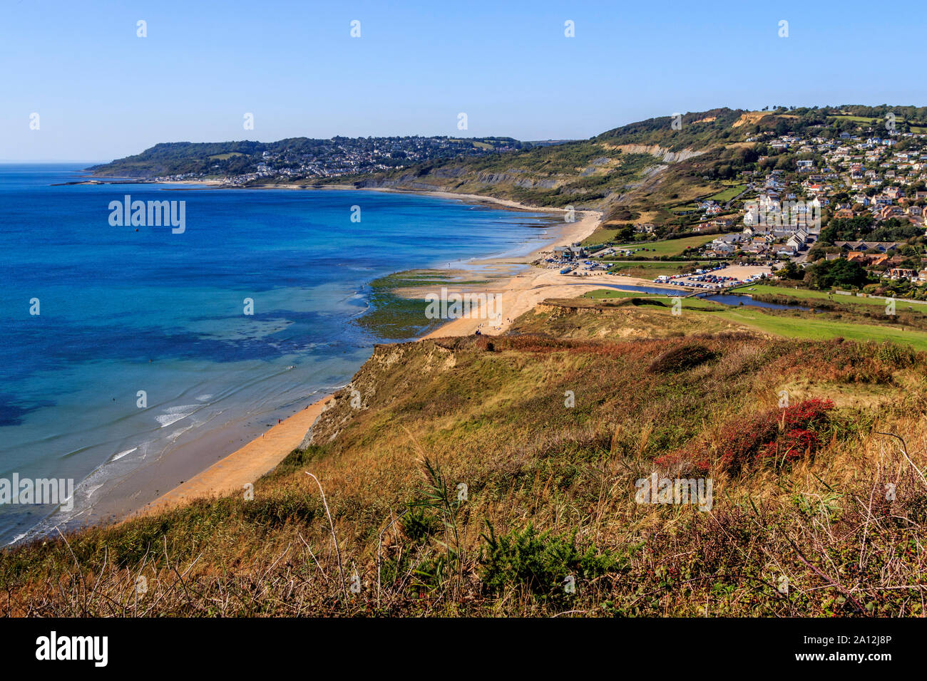 charmouth seaside resort, crumbling cliff strata, fossil hunting, south coast, long distance footpath,dorset, england, uk, gb Stock Photo