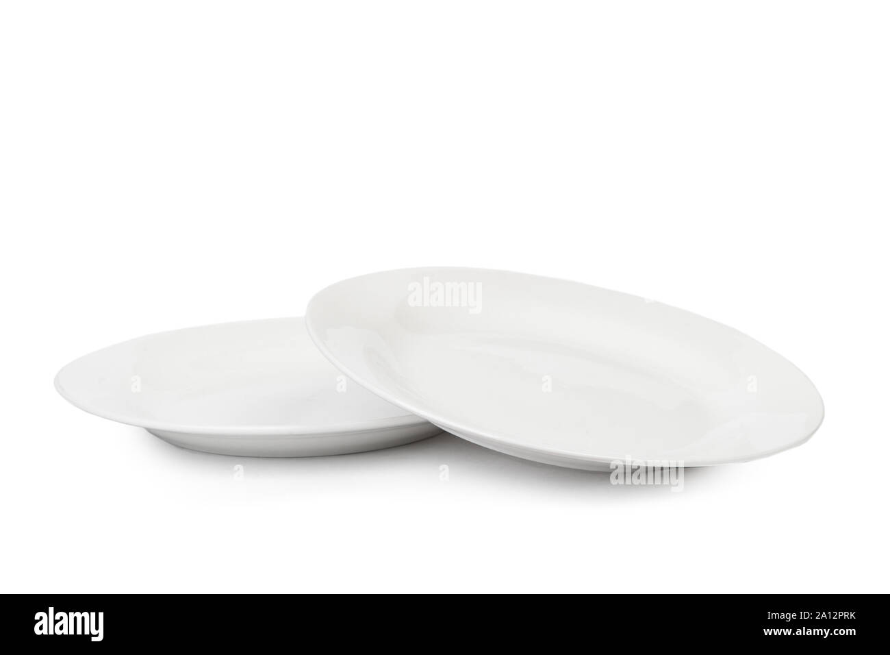 Empty white plate isolated on white background Stock Photo - Alamy