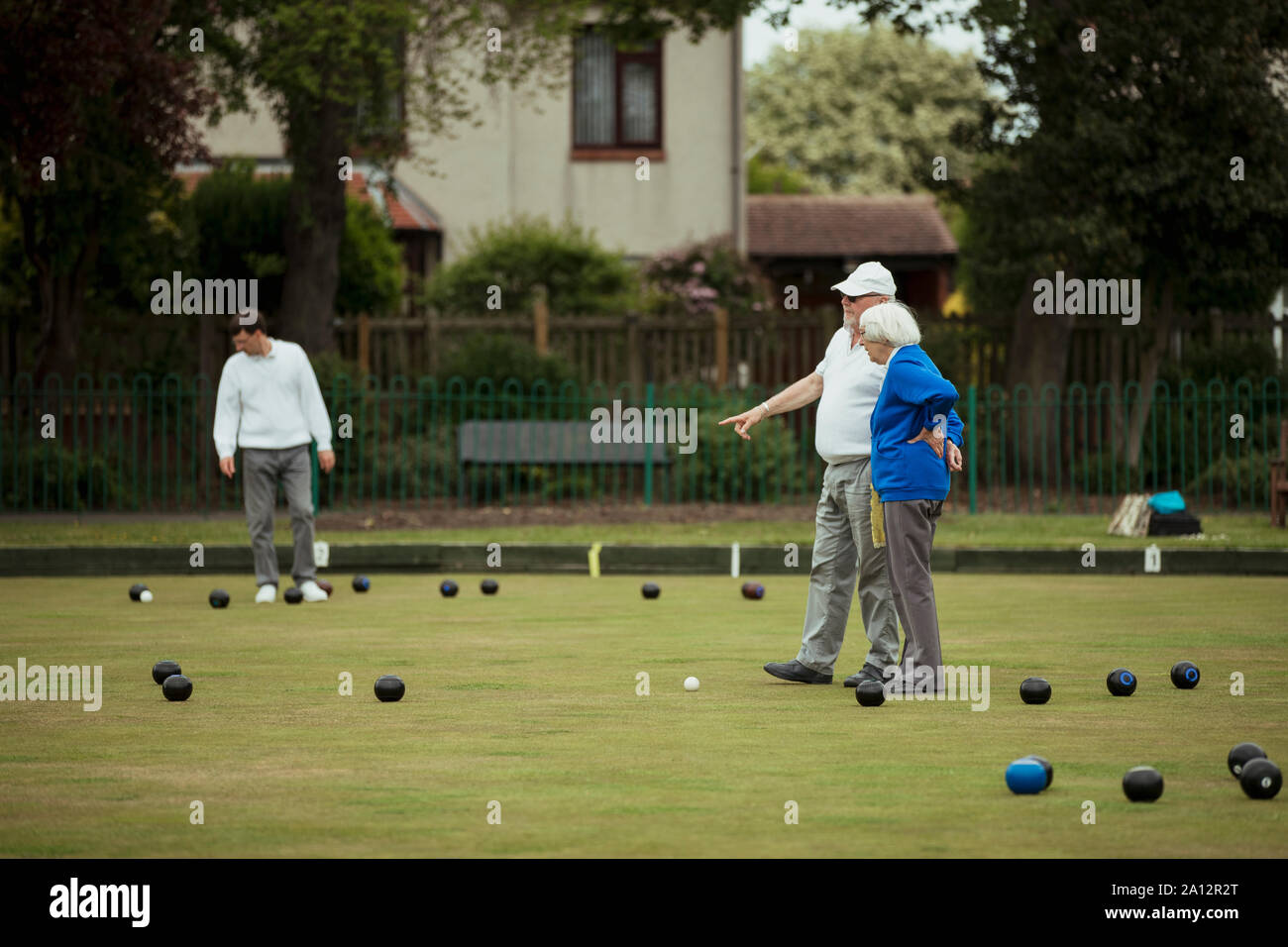 Bowling on grass hires stock photography and images Alamy