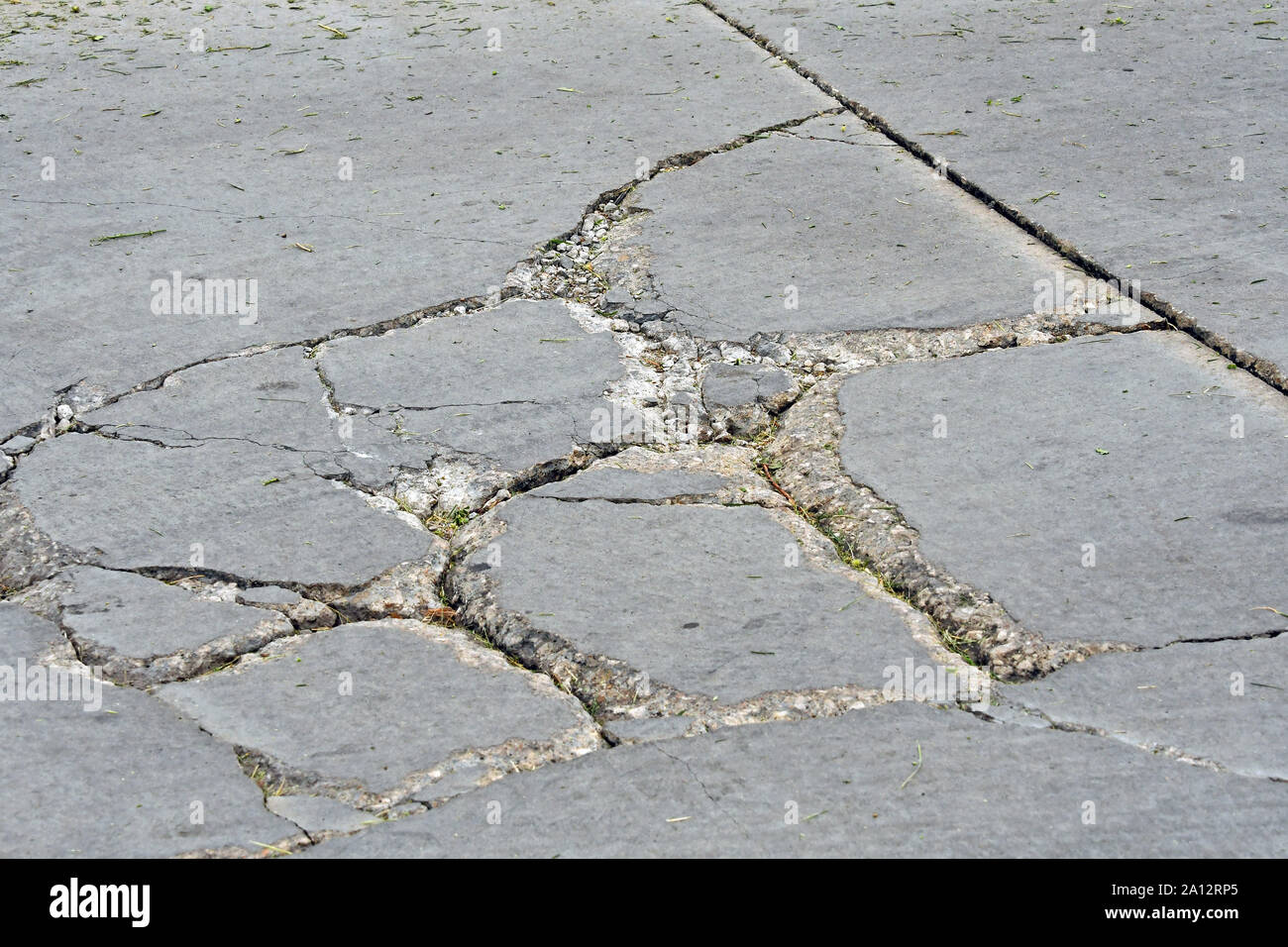 Emporia, Kansas, USA, September 20, 2019Example of a broken concrete driveway in a McDonald’s parking lot due to the freeze thaw cycle weather. Credit Mark Reinstein/MediaPunch Stock Photo