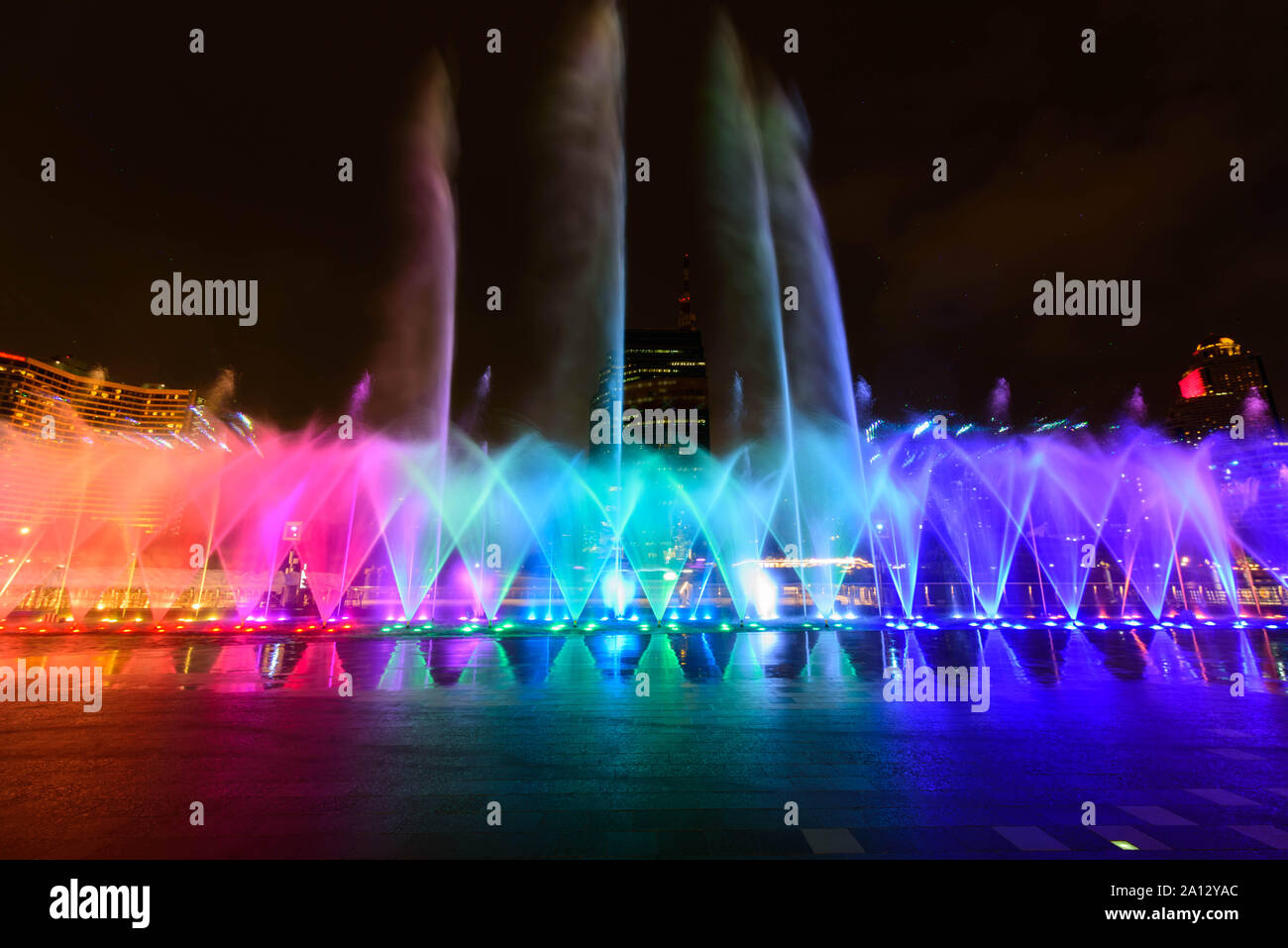 the fountain showing with lighting in night time Stock Photo - Alamy