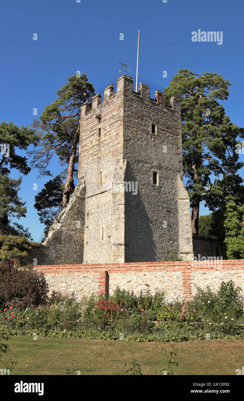 Medieval castle tower inside a walled garden Stock Photo