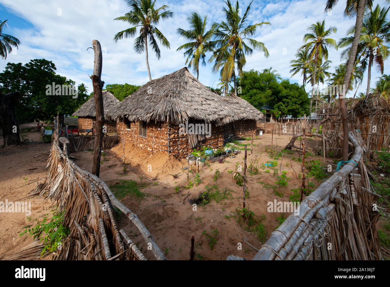 Stone and mud huts homes with thatched roofs in Kenya, Africa Stock