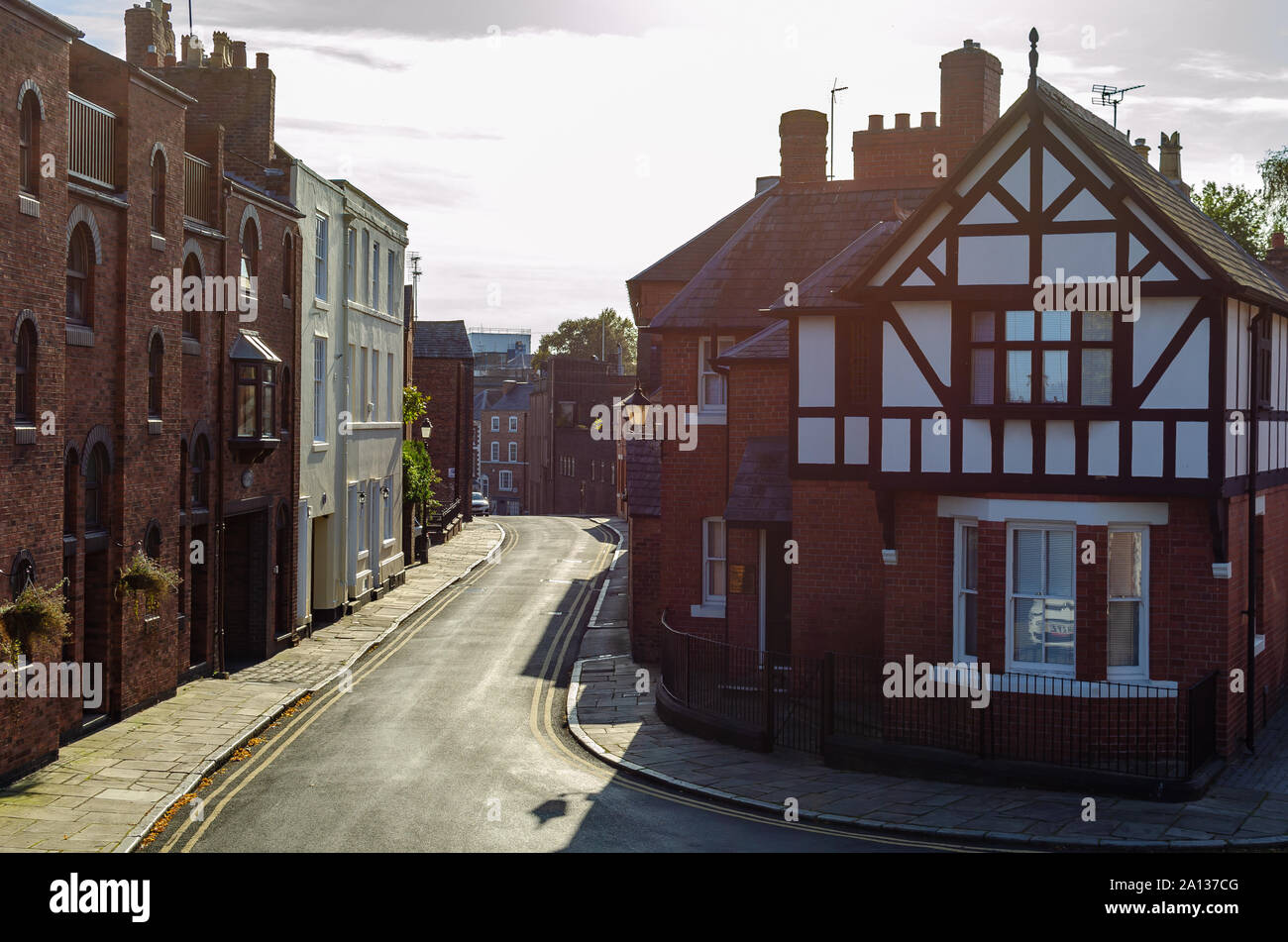 Beautiful and quiet Duke street in Chester with traditional Tudor style house. Photo taken during the sunset. Stock Photo